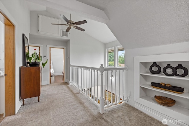 8213 S Fawcett Ave, Tacoma, WA 98408 - corridor with vaulted ceiling and carpet floors