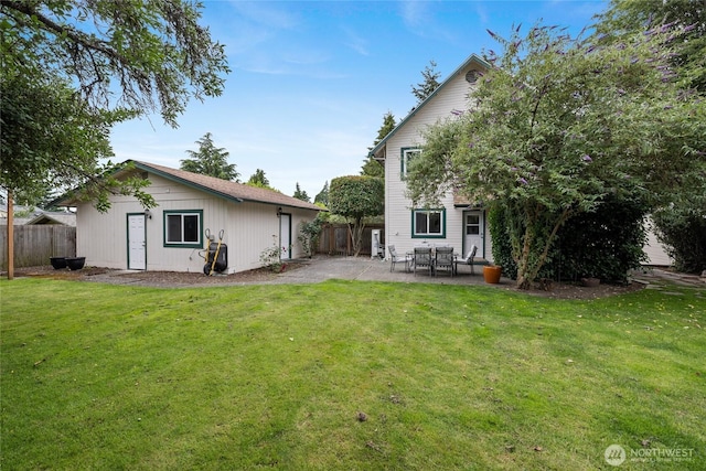 8213 S Fawcett Ave, Tacoma, WA 98408 - rear view of house with a patio area