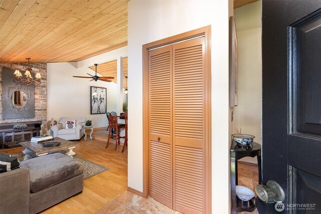 13605 SE 233rd St, Kent, WA 98042 - living area with wood ceiling, a ceiling fan, and a chandelier