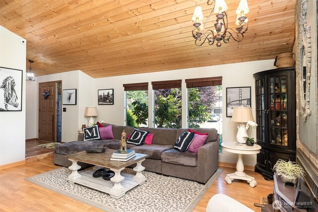 13605 SE 233rd St, Kent, WA 98042 - living room featuring wood ceiling, a chandelier, wood finished floors, and vaulted ceiling