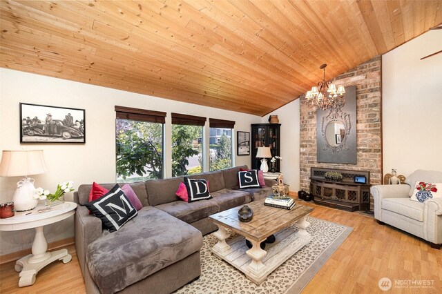 13605 SE 233rd St, Kent, WA 98042 - living room featuring vaulted ceiling, a chandelier, wooden ceiling, and light wood finished floors