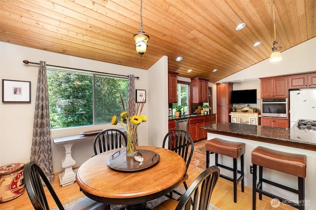 13605 SE 233rd St, Kent, WA 98042 - dining room with vaulted ceiling, recessed lighting, light wood-type flooring, and wood ceiling