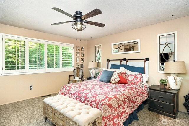 13605 SE 233rd St, Kent, WA 98042 - bedroom featuring carpet floors, a textured ceiling, and a ceiling fan