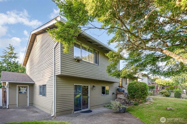 13605 SE 233rd St, Kent, WA 98042 - rear view of house featuring a patio area