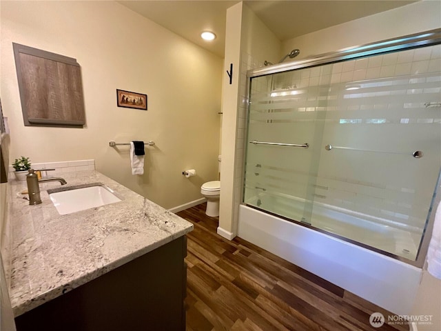 20795 Kahler Dr Unit E7, Leavenworth, WA 98826 - full bath featuring wood finished floors, vanity, combined bath / shower with glass door, and recessed lighting