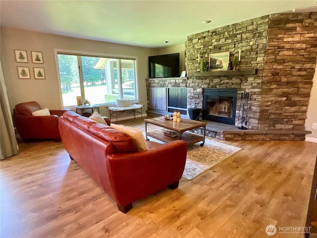 20795 Kahler Dr Unit E7, Leavenworth, WA 98826 - living area with a fireplace and wood finished floors