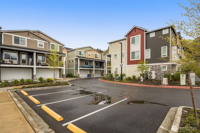 12124 NE 194th Ct Unit C, Bothell, WA 98011 - uncovered parking lot with a residential view