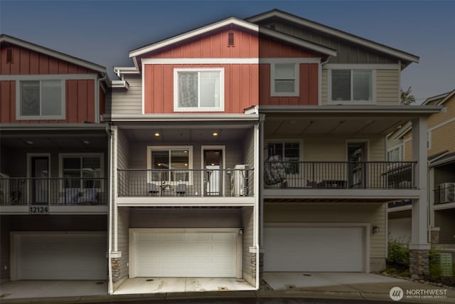 12124 NE 194th Ct Unit C, Bothell, WA 98011 - multi unit property with board and batten siding and a garage