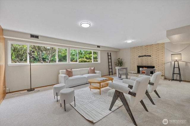 6520 NE 60th St, Seattle, WA 98115 - carpeted living room with plenty of natural light and a brick fireplace