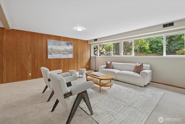 6520 NE 60th St, Seattle, WA 98115 - living room featuring wood walls and carpet floors