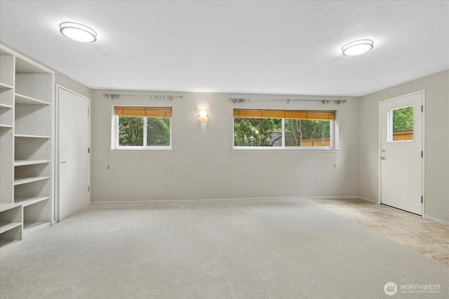 6520 NE 60th St, Seattle, WA 98115 - unfurnished room with healthy amount of natural light and carpet