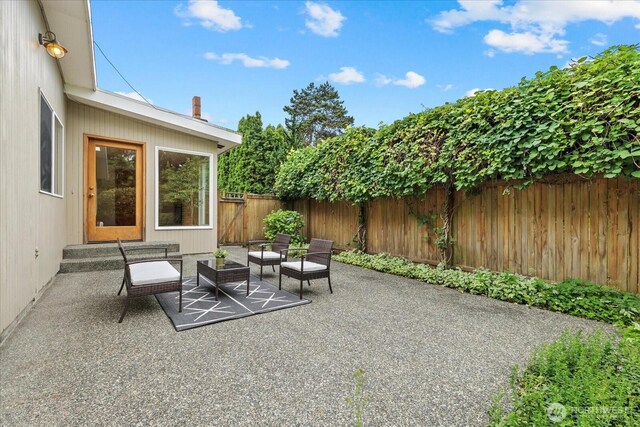 6520 NE 60th St, Seattle, WA 98115 - fenced backyard with a patio area and an outdoor living space