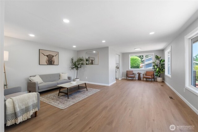 10218 63rd Avenue Ct E, Puyallup, WA 98373 - living area with light wood finished floors and recessed lighting
