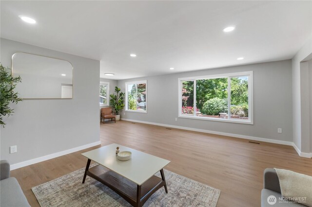 10218 63rd Avenue Ct E, Puyallup, WA 98373 - living room featuring light wood-style floors and recessed lighting