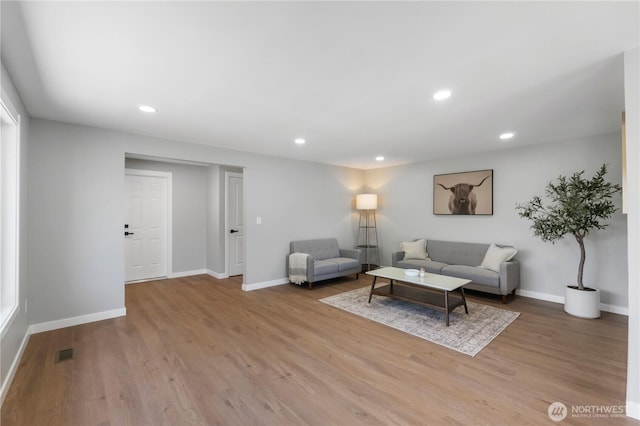 10218 63rd Avenue Ct E, Puyallup, WA 98373 - living area with wood finished floors and recessed lighting