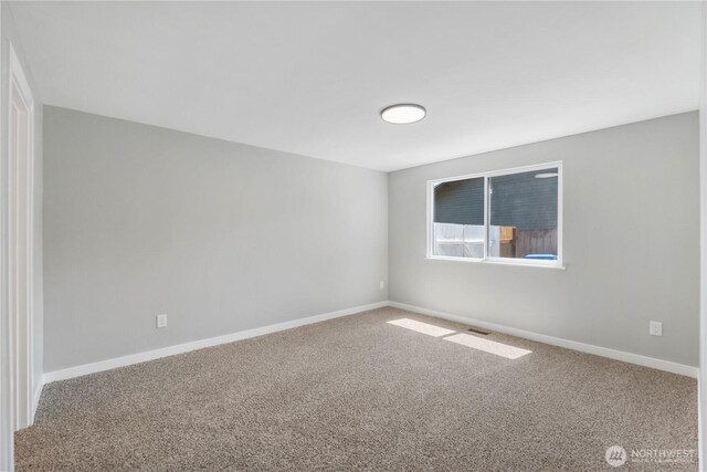 10218 63rd Avenue Ct E, Puyallup, WA 98373 - carpeted empty room featuring baseboards