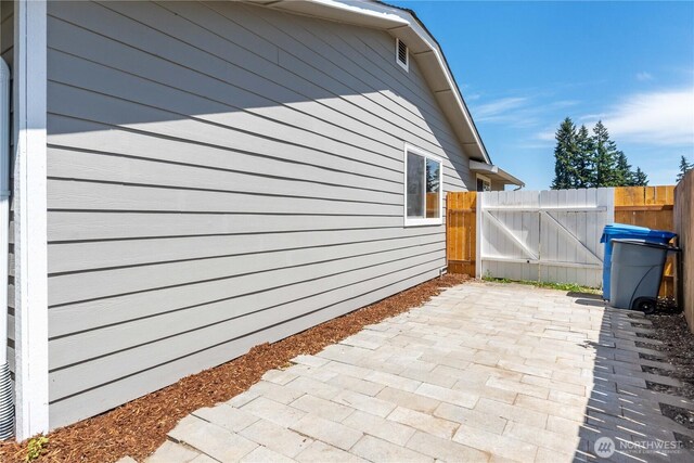 10218 63rd Avenue Ct E, Puyallup, WA 98373 - view of property exterior with a patio area