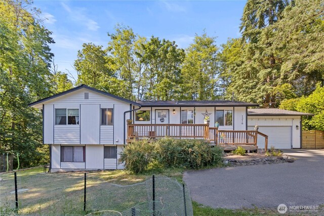 1216 NE Vena Ave, Bremerton, WA 98311 - view of front of house featuring driveway and an attached garage