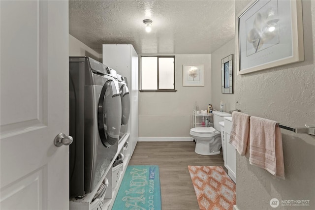 1216 NE Vena Ave, Bremerton, WA 98311 - bathroom featuring a textured ceiling, wood finished floors, and a textured wall