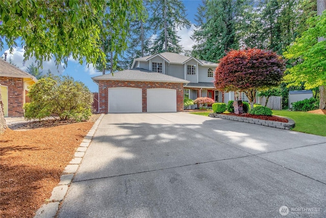 6314 75th Avenue Ct W, University Place, WA 98467 - traditional-style home featuring driveway, brick siding, an attached garage, and a shingled roof