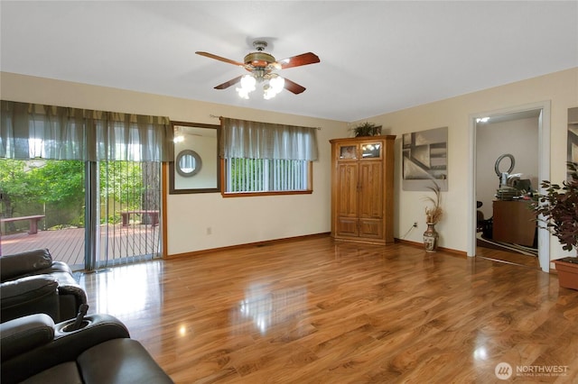 6314 75th Avenue Ct W, University Place, WA 98467 - living room featuring ceiling fan and wood finished floors