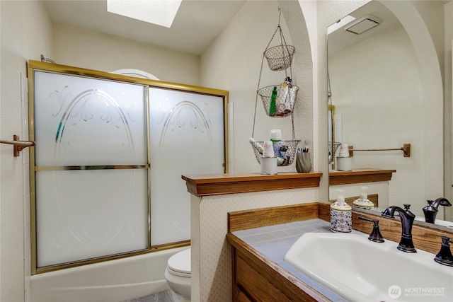 6314 75th Avenue Ct W, University Place, WA 98467 - full bath featuring a skylight, vanity, and combined bath / shower with glass door