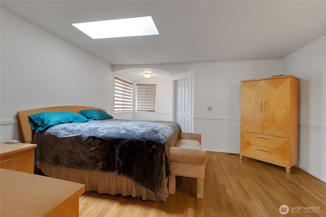 6314 75th Avenue Ct W, University Place, WA 98467 - bedroom featuring a skylight and light wood-style floors