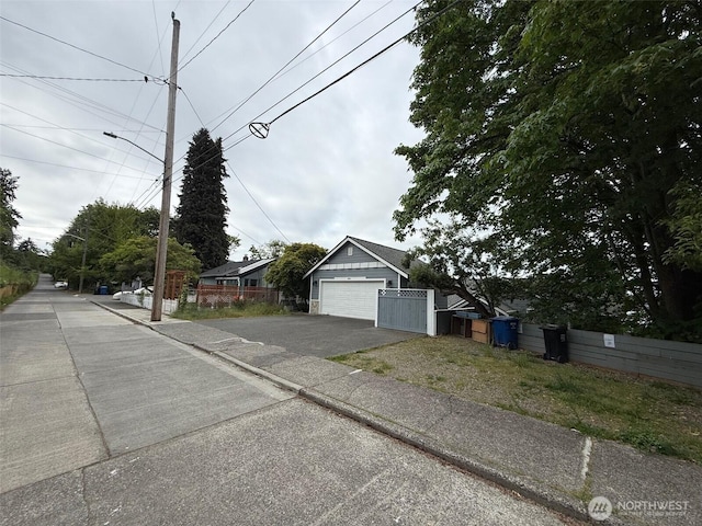 9844 Arrowsmith Ave S, Seattle, WA 98118 - view of concrete road with street lighting