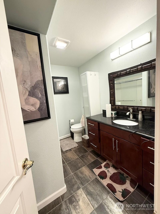9844 Arrowsmith Ave S, Seattle, WA 98118 - bathroom with baseboards and vanity