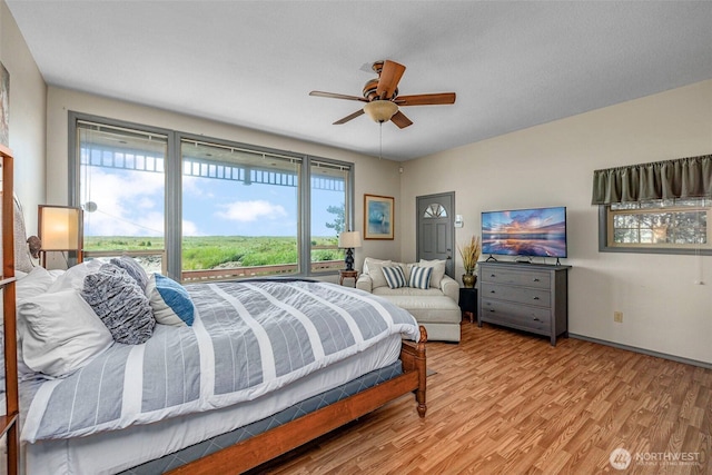 23309 J Pl, Ocean Park, WA 98640 - bedroom featuring light wood-style floors and ceiling fan