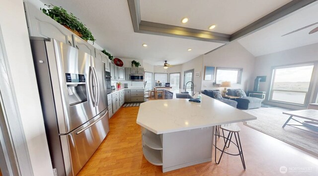 23309 J Pl, Ocean Park, WA 98640 - kitchen with appliances with stainless steel finishes, ceiling fan, light countertops, gray cabinetry, and lofted ceiling