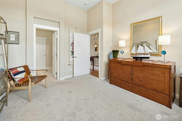 32 Heron Rd, Port Ludlow, WA 98365 - living area with light carpet and a high ceiling