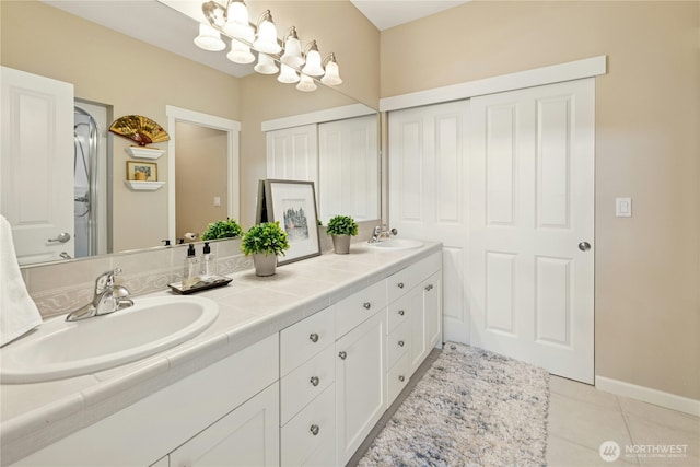 32 Heron Rd, Port Ludlow, WA 98365 - bathroom with double vanity and tile patterned floors