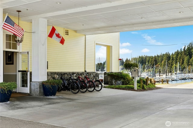 32 Heron Rd, Port Ludlow, WA 98365 - view of exterior entry with stone siding