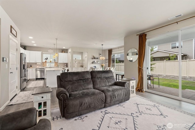 3115 Stephanie Loop NE, Lacey, WA 98516 - living room with light wood-type flooring and recessed lighting
