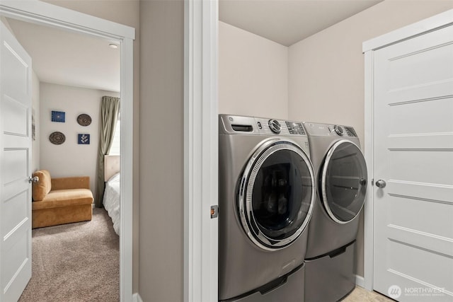3115 Stephanie Loop NE, Lacey, WA 98516 - laundry area with washer and clothes dryer and light colored carpet