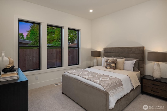 10425 NE 28th Pl, Bellevue, WA 98004 - carpeted bedroom with baseboards and recessed lighting