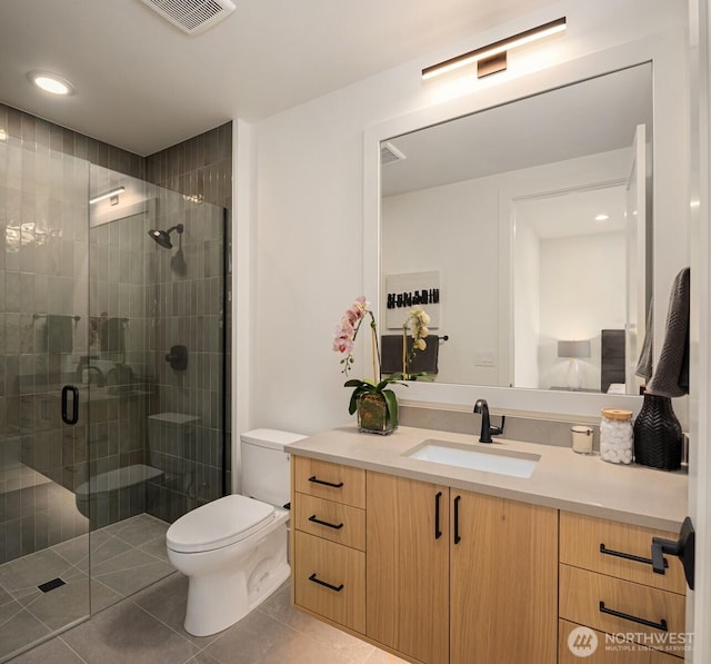 10425 NE 28th Pl, Bellevue, WA 98004 - bathroom with vanity, tile patterned floors, and a stall shower