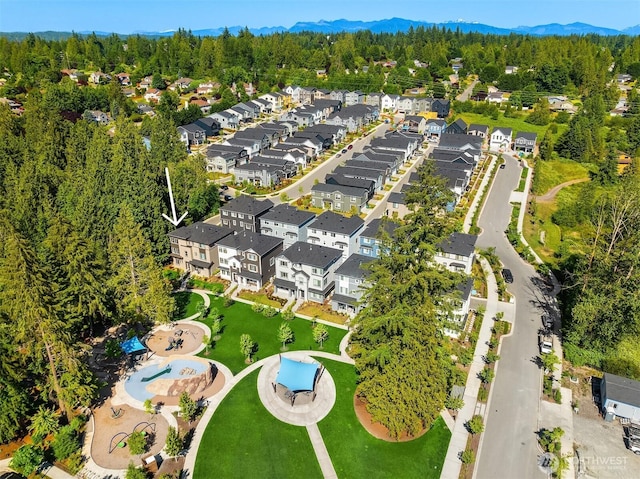27156 NE Walden Way, Duvall, WA 98019 - aerial perspective of suburban area with a forest and mountains