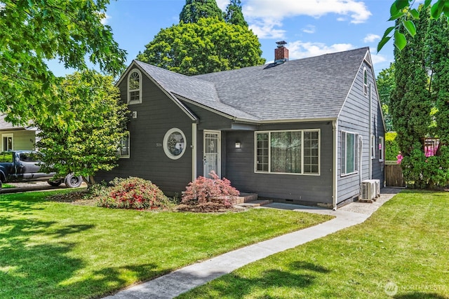 516 26th Ave, Longview, WA 98632 - view of front of property with roof with shingles, a front yard, and a chimney
