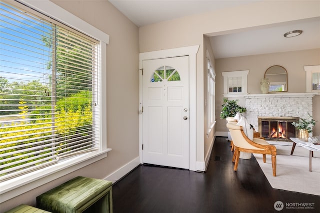 4745 35th Ave SW, Seattle, WA 98126 - foyer with dark wood finished floors and a brick fireplace