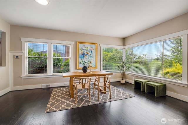 4745 35th Ave SW, Seattle, WA 98126 - dining area with baseboards and wood finished floors