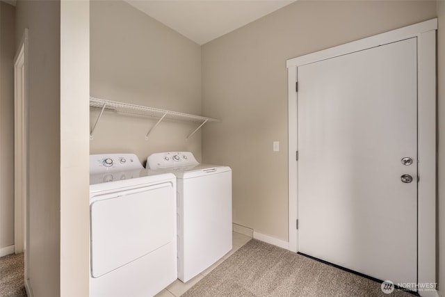 4745 35th Ave SW, Seattle, WA 98126 - washroom featuring washing machine and clothes dryer and light colored carpet