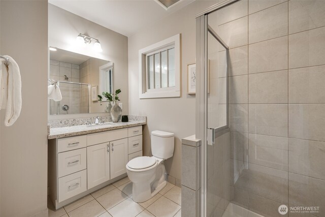 4745 35th Ave SW, Seattle, WA 98126 - bathroom with vanity, a stall shower, and tile patterned floors