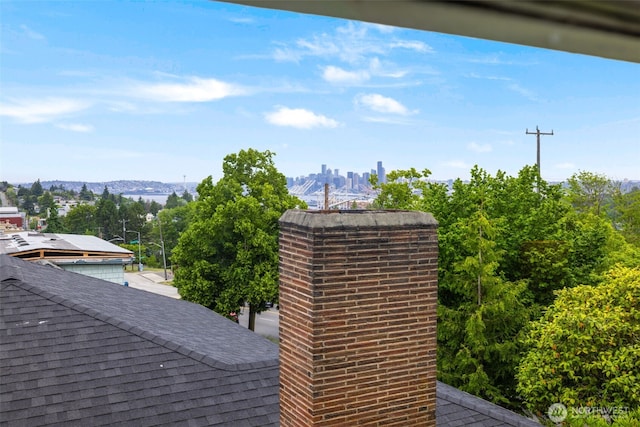 4745 35th Ave SW, Seattle, WA 98126 - exterior view of a chimney and roof with shingles