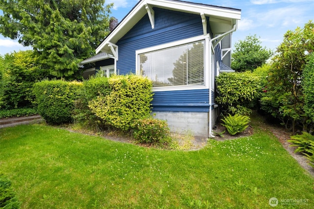 4745 35th Ave SW, Seattle, WA 98126 - view of side of property with a yard
