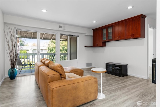 5029 84th St SW Unit 109, Mukilteo, WA 98275 - living area featuring light wood finished floors and recessed lighting