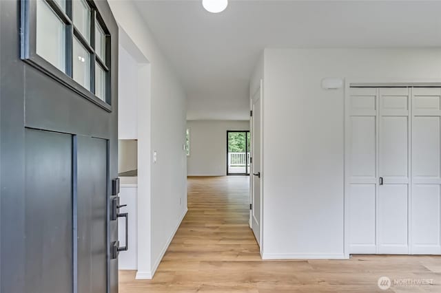 13428 SE 302nd Pl, Auburn, WA 98092 - hallway with light wood-style floors and baseboards