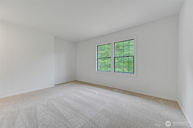 13428 SE 302nd Pl, Auburn, WA 98092 - unfurnished room featuring light colored carpet