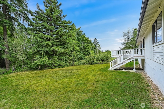 13428 SE 302nd Pl, Auburn, WA 98092 - view of green lawn with stairway and a deck